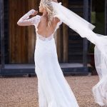 long-sleeved Maggie Sottero gown classic sheath wedding dress